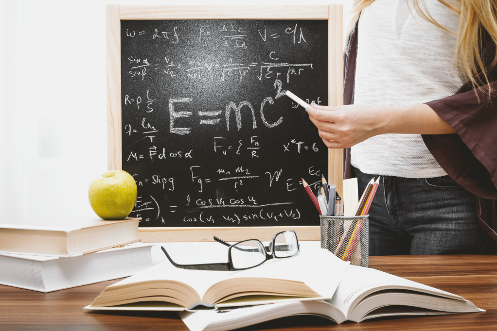 Photo of Tim tutoring a student